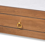 Struttura letto a rotelle singola in legno con anelli in metallo color marrone noce e oro