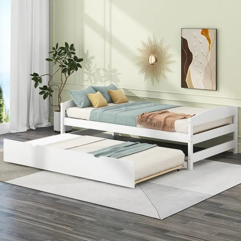 Letto a piattaforma singolo con pratico letto estraibile per gli ospiti
